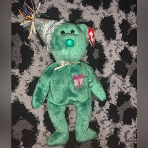 May TY Beanie Baby bear. 💚